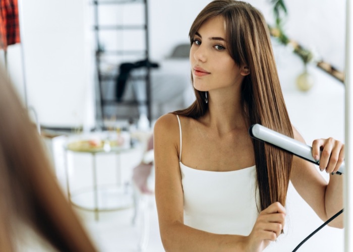 Straightening with a flat iron